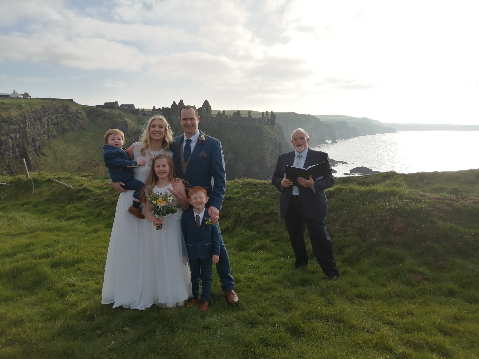 Wedding party with John Foley after an outdoor ceremony on the North Coast